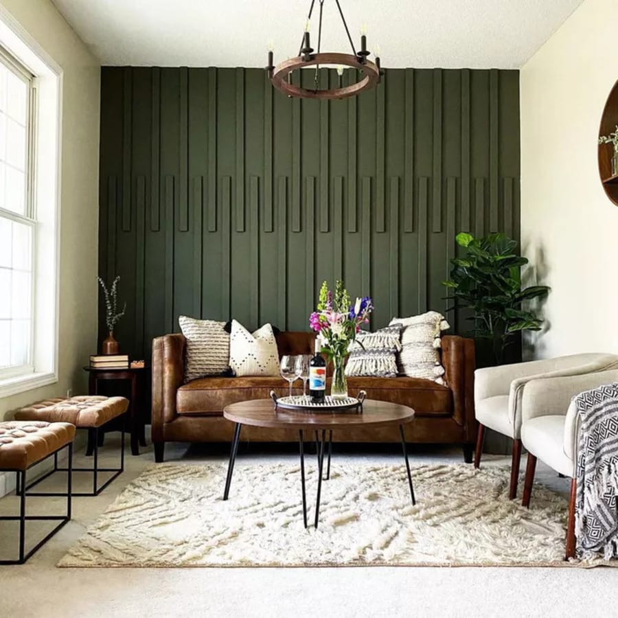 Dark green accent wall with pattern
